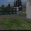 Industrial Factory Building With Storage Tanks Towers Paved Ground And Green Lawn Area