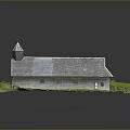 Rural Church Building With Gray Roof Steeple And Green Grass Surroundings