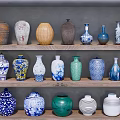 Ceramic Vessels Displayed on Wooden Shelves with Various Colors Shapes and Patterns