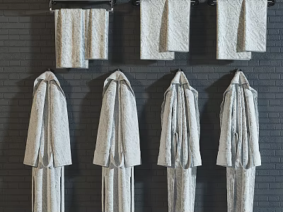 Four Cozy Bath Robes Hanging On Gray Brick Wall Interior With Three Soft Towels 3d model