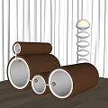 Brown Cylindrical Design Single Sofa With Metal Accents And White Spiral Lamp On Wooden Floor
