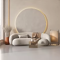 Modern Beige Sectional Sofa with Cushion Throw Blanket Near Round Decorative Wall and Floor Lamp
