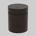 Brown Cylindrical Wooden Stool With Textured Surface And Natural Wood Grain