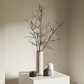 White Textured Vase With Bare Branches In Minimalist Room Corner On Table