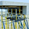 Construction Scaffolding Structure Supporting Concrete Platform With Yellow And Blue Poles In Open Site 3d model