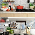 Essential Kitchenware Collection With Red Pot Frying Pan And Spice Bottles On Tile Backsplash