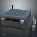 Dark Colored AV Receiver With Knobs Display Screen Ventilation Grilles Antennas And Remote Control