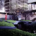 Modern Garden Landscape With Water Pond Lush Green Trees And Seating Area