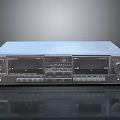 Silver Black Vintage Computer Tape Drive Featuring Multiple Buttons Knobs And Smooth Reflective Surface