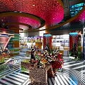 Modern Retail Store Interior With Colorful Ceiling Display Shelves And Merchandise
