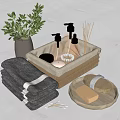 Elegant Bathroom Accessories Including Stacked Towels Aromatherapy Bottles Soap And Bath Brush