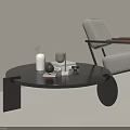 Modern Black Round Coffee Table With Decorative Vase Books In Living Room