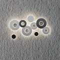 Modern Circular Wall Decor With Gold Silver Rings And Illuminated Layered Design