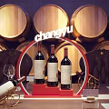 Elegant Wine Cellar Interior With Wooden Barrels Long Table And Wine Glasses