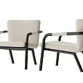 Stylish Modern Beige Upholstered Armchairs With Black Armrests And Wooden Legs