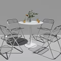 Modern Dining Table and Chair Set with White Round Top Transparent Seats and Metal Frame