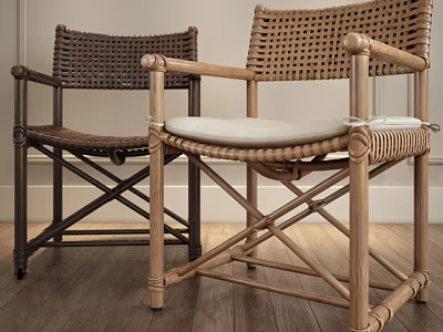 Modern Natural Rattan Armchairs With Crossed Legs And White Cushions 3d model
