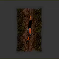 Orange Off Road Motorcycle Parked on Grassy Dirt Hillside with Natural Rough Terrain