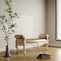 Elegant Beige Upholstered Bench With Carved Wooden Frame Green Plant In White Vase
