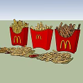 McDonald's French Fries In Red Containers With Scattered Pieces And Ketchup Packets