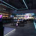 Modern Bar Interior Design Featuring Neon Lights Counter Seating And Glass Wall Lighting