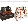 Vintage Leather Suitcases Stacked In Black Brown And White With Brass Corner Details