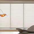 Light Colored Window Blinds In Modern Living Room With Lounge Chair And Floor Lamp
