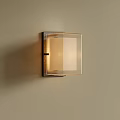Modern Minimalist Wall Light On Beige Wall With Square Transparent Glass Shade And Warm Light