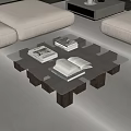 Modern Living Room Interior With Glass Coffee Table Open Books Sofa And Decorative Items
