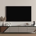 Sleek Modern TV Stand in Gray and Brown with Wall Mounted TV and Decorative Ornaments
