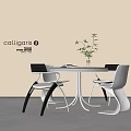 Modern Black And White Table With Chairs And Potted Plant In Interior
