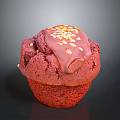 Delicious Red Cupcake With Chocolate Drizzle And Nut Sprinkles On Top