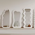 White Decorative Mirrors With Unique Shapes In Minimalist Interior Design