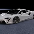 White Sports Car With Sleek Aerodynamic Body And Large Alloy Wheels