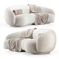 Modern Cream Sectional Sofa With Soft Textured Fabric Curved Design Throw Blanket And Accent Pillows