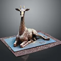 Lying Giraffe Sculpture on Blue Mat with Brown Base in Dark Background