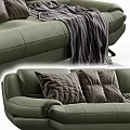 Modern Green Sofa Interior With Decorative Pillows And Striped Throw Blanket 3d model