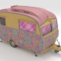 Vintage Retro Trailer With Pink Yellow Exterior And Floral Pattern Design