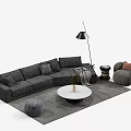 Gray L Shaped Sofa And Round White Coffee Table Set With Cushions Poufs And Rug