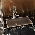 Modern Kitchen Interior With Wooden Cabinets Black Marble Countertop And Golden Backsplash