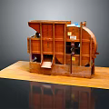 Wooden Computer Model Featuring Multiple Compartments And Components On Platform Structure