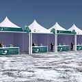 White Exhibition Tents Featuring Green Decorations and Booth Tables