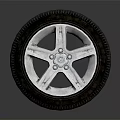 Stylish Car Tire With Silver Five Spoke Wheel Rim And Detailed Design