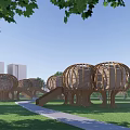Round Dome Shaped Wooden Houses Connected by White Pathway Surrounded by Green Grass and Trees