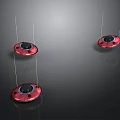 Three Red Circular Reflective Spacecraft With Black Center Suspended In Dark Cosmic Background