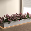Pink and Purple Flowers in Gray Planter with Glowing Base by Window on Wooden Floor