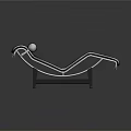 Cat Resting On Modern Black Chaise Lounge With Silver Metal Frame