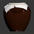 Traditional Brown Clay Jar With White Cloth Cover Tied By Rope On Dark Background