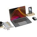 Modern Laptop Workspace Setup with Smartphone Stand Mouse Coffee Cup and Notes