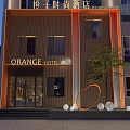 Modern Multi Story Orange Hotel Building With Illuminated Exterior In City Night